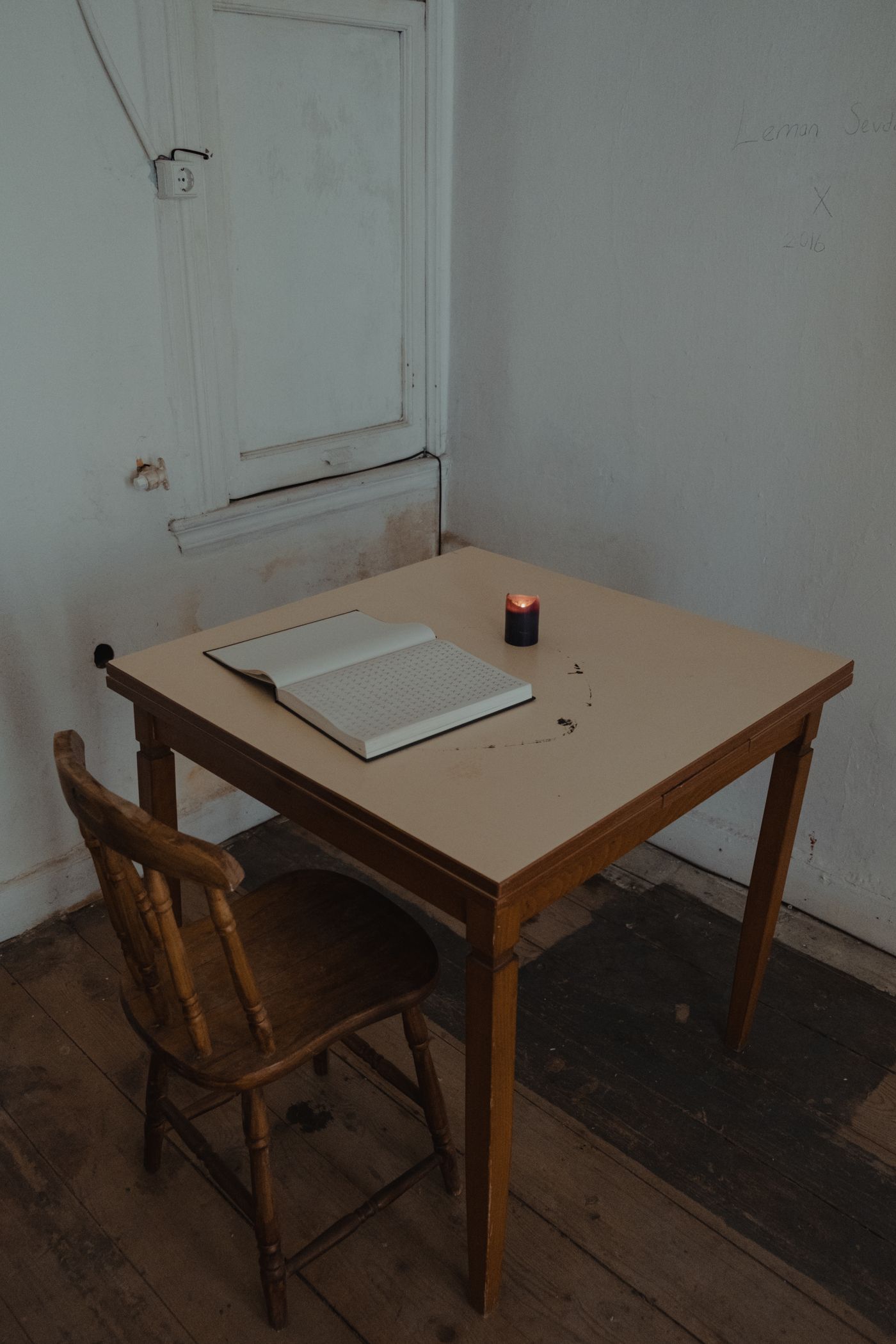 Desk with notebook and books
